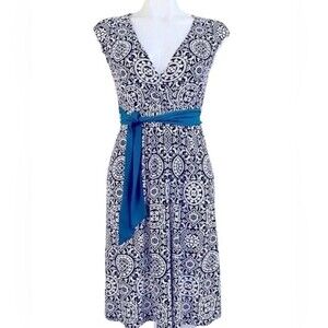 Black and white faux wrap dress with teal belt size XS